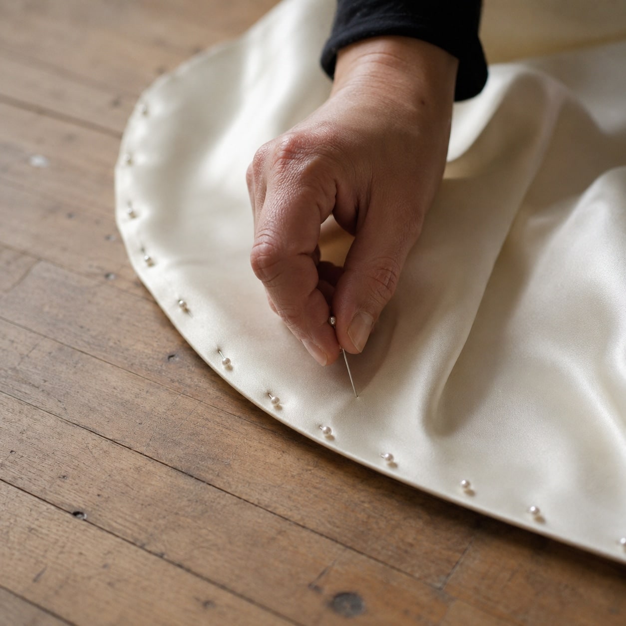 Silk hem pinning detail