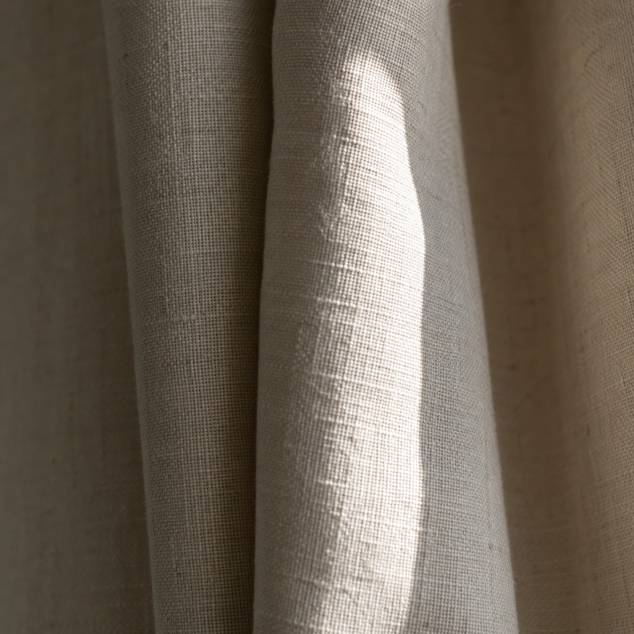 Heavyweight cream linen curtain folds